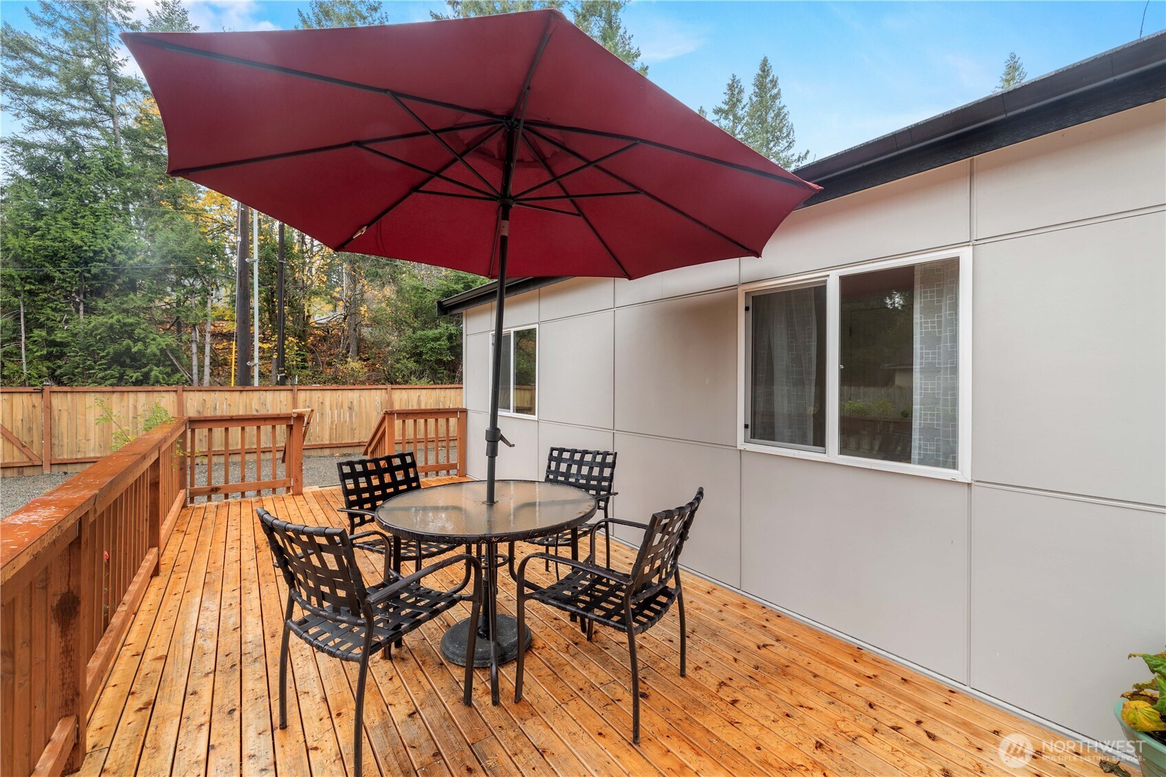 27428 Witte Road Southeast Maple Valley, WA 98038 - Photo 22 of 31 a patio with a patio table and chairs