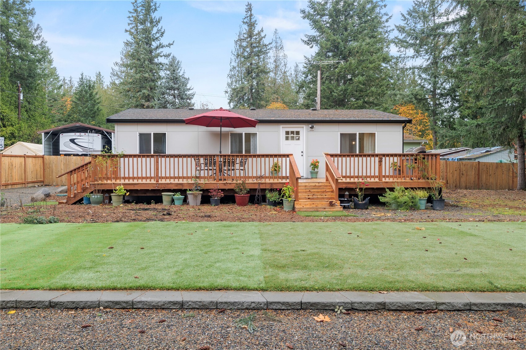 27428 Witte Road Southeast Maple Valley, WA 98038 - Photo 25 of 31 a front view of a house with a yard