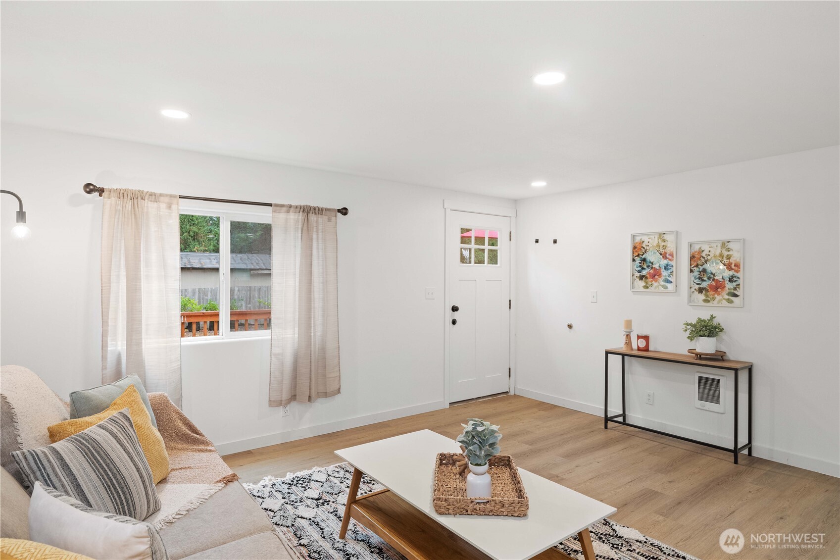 27428 Witte Road Southeast Maple Valley, WA 98038 - Photo 7 of 31 a living room with furniture and wooden floor