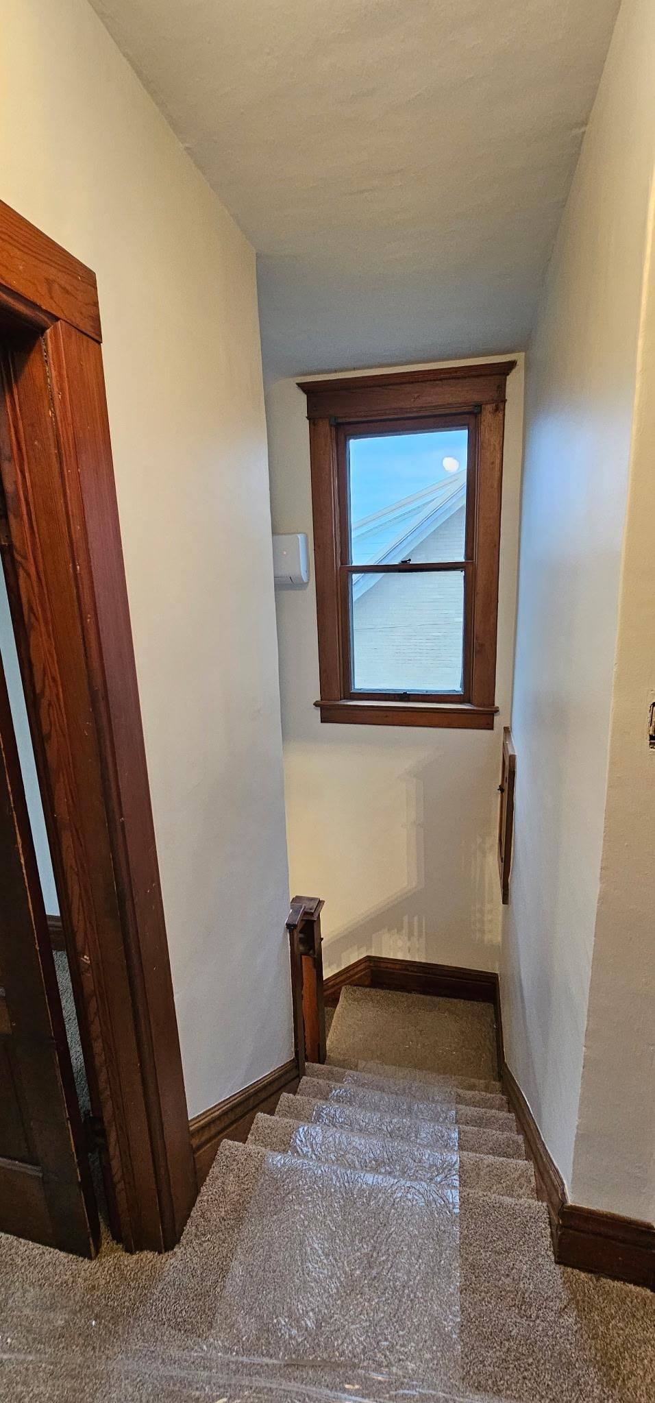 110 West Catlin Street Elizabeth, IL 61028 - Photo 11 of 31 an empty room with wooden floor and a window