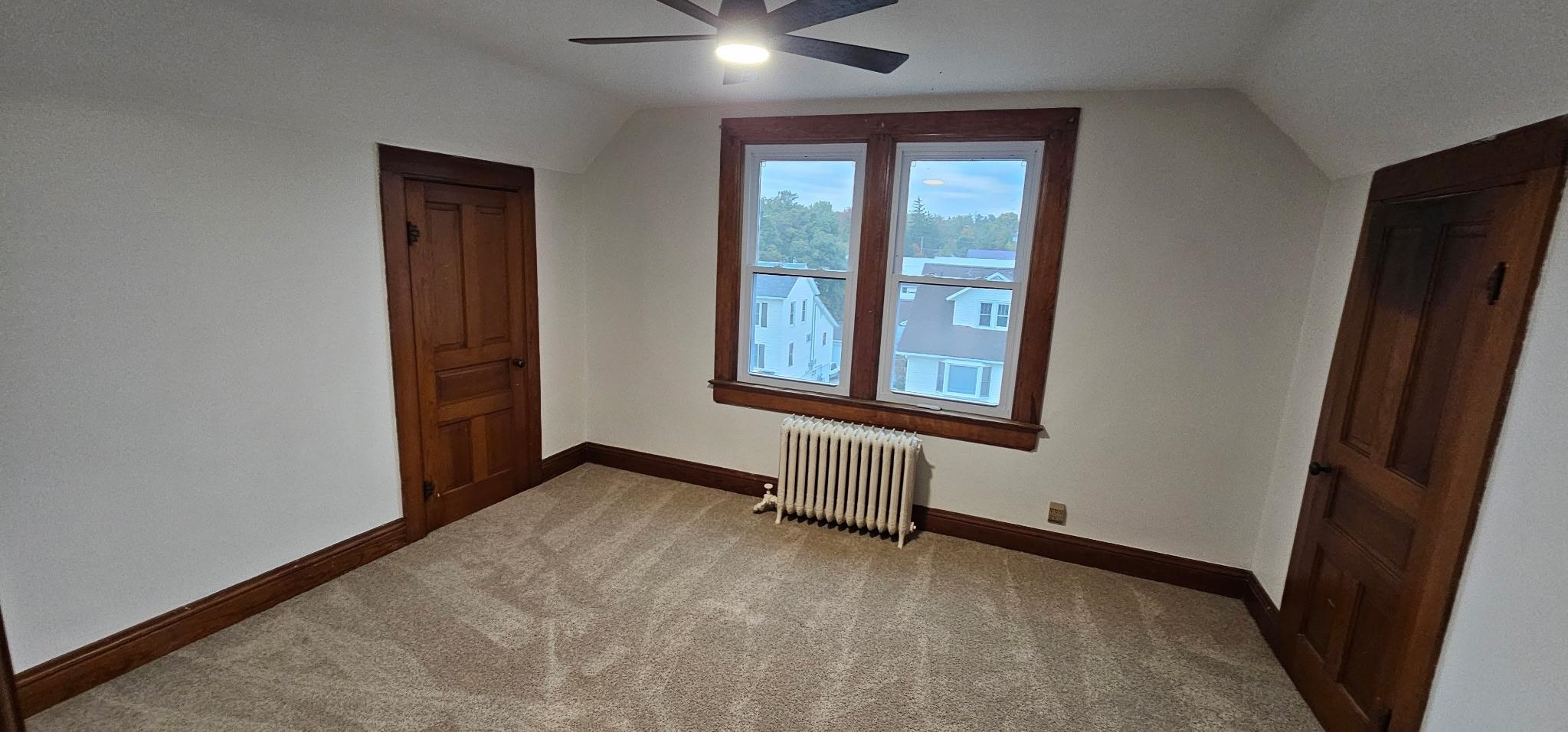 110 West Catlin Street Elizabeth, IL 61028 - Photo 12 of 31 an empty room with windows