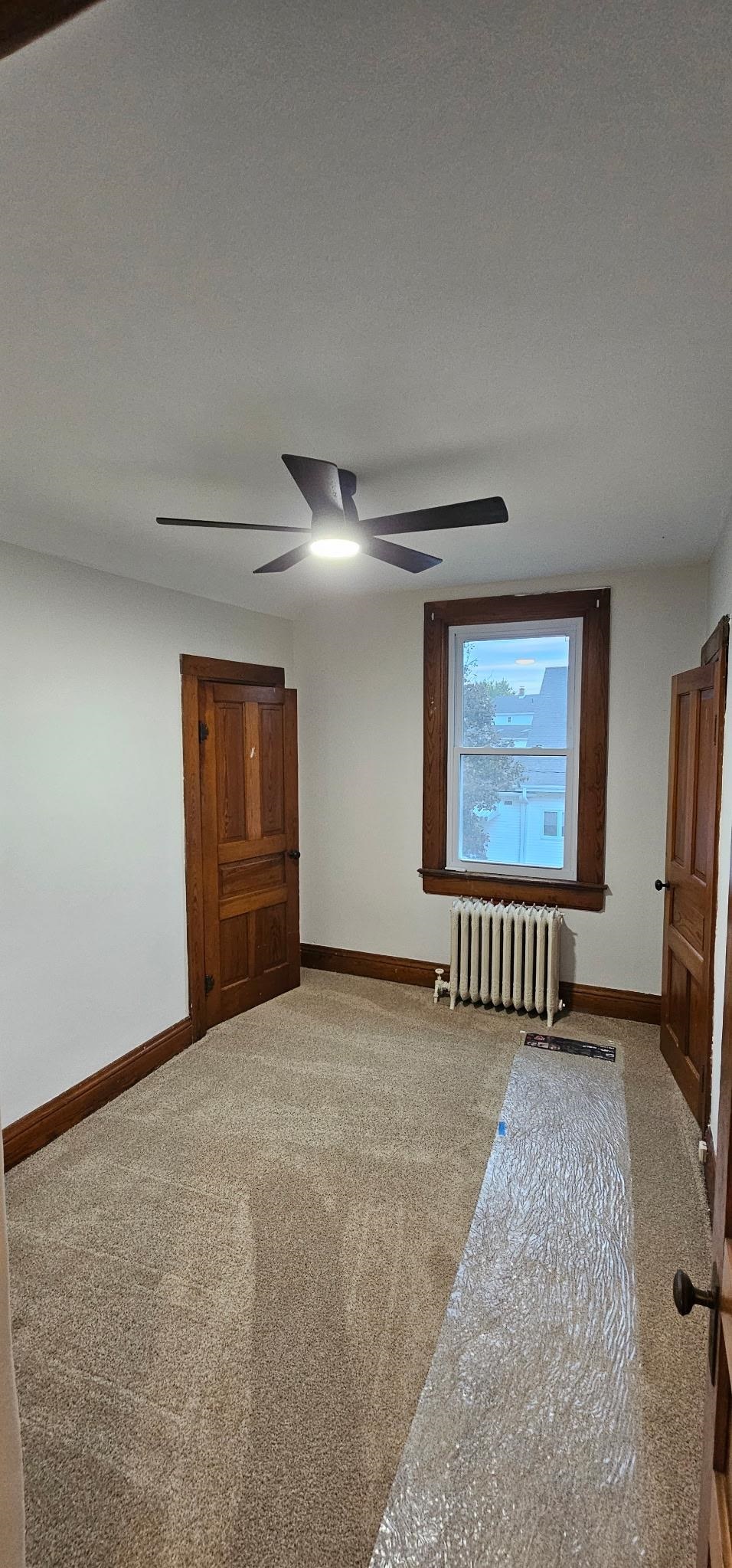 110 West Catlin Street Elizabeth, IL 61028 - Photo 14 of 31 a view of an empty room with a window