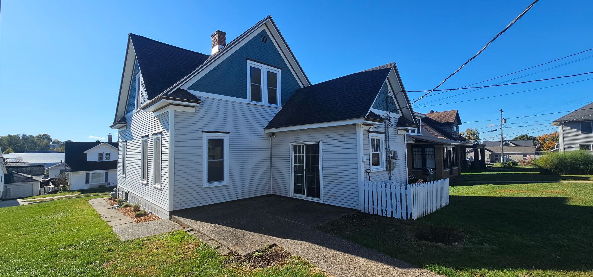 110 West Catlin Street Elizabeth, IL 61028 - Photo 17 of 31 a front view of a house with a yard