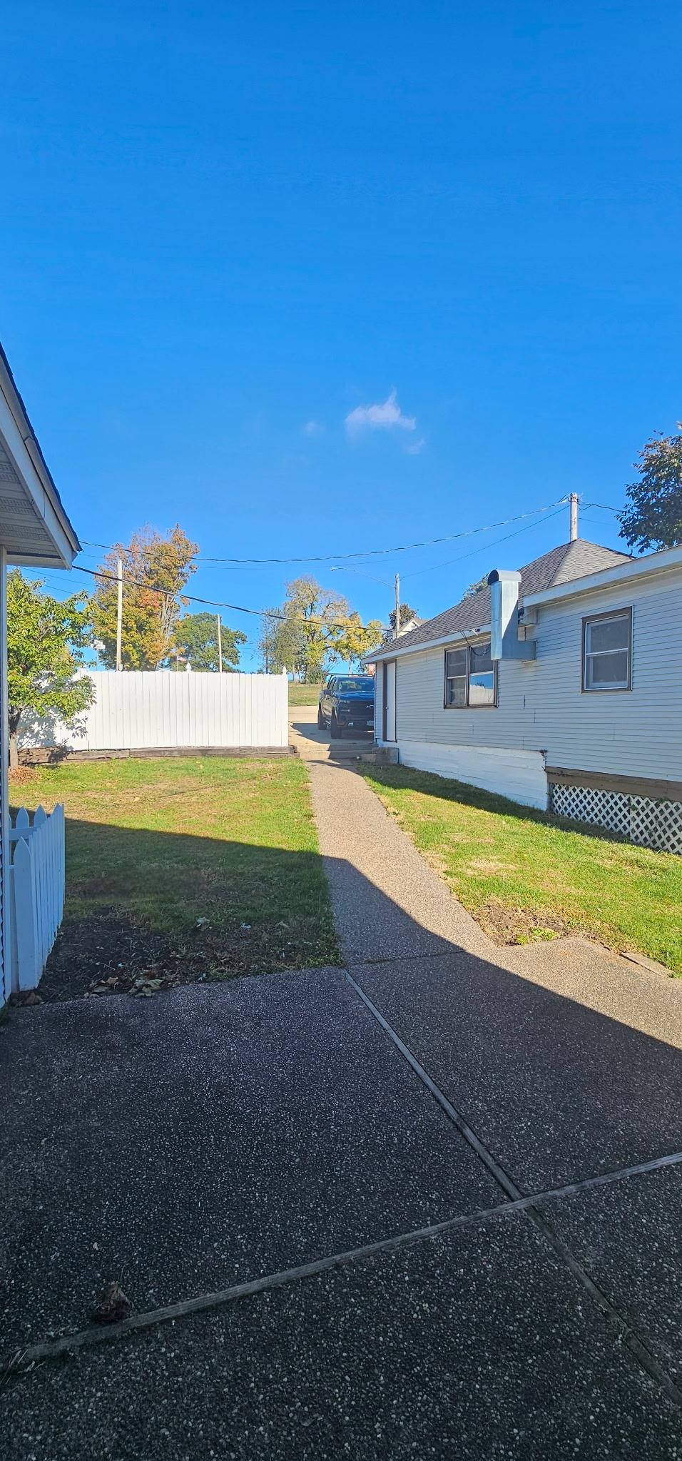110 West Catlin Street Elizabeth, IL 61028 - Photo 20 of 31 a view of a swimming pool with an ocean view
