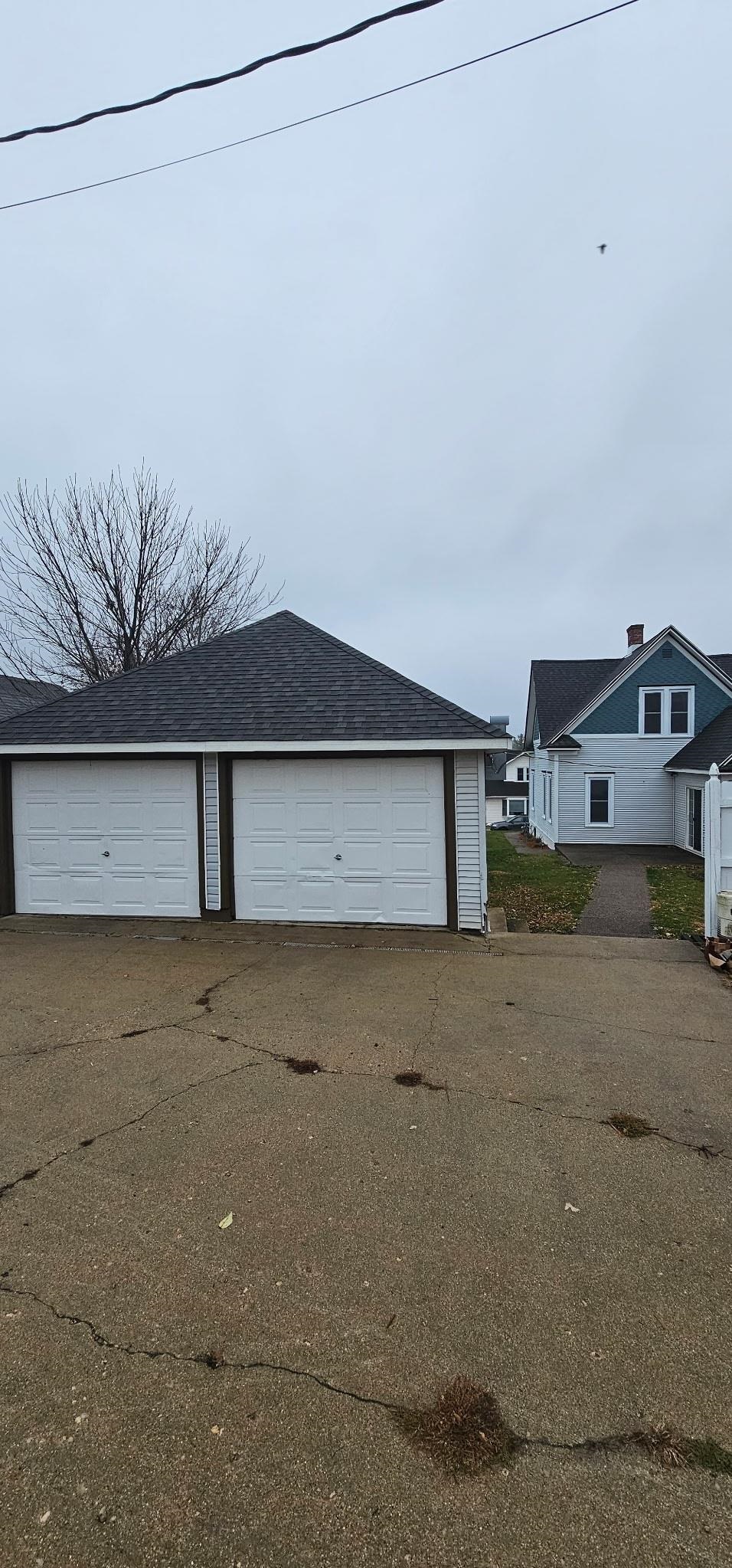 110 West Catlin Street Elizabeth, IL 61028 - Photo 24 of 31 a view of a house with a street