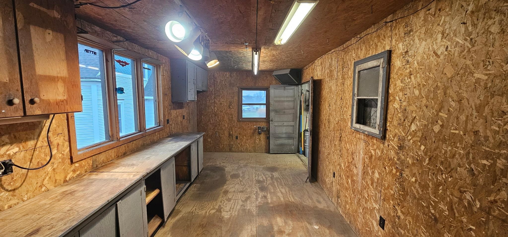 110 West Catlin Street Elizabeth, IL 61028 - Photo 26 of 31 a bathroom with a granite countertop sink and a mirror