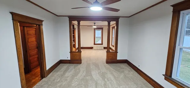 a view of a livingroom with a staircase