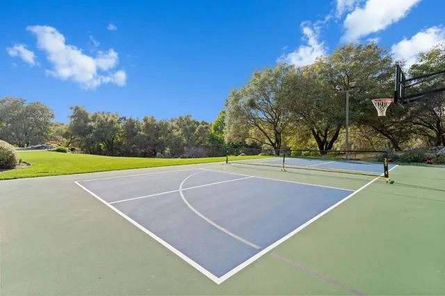 an aerial view of a house with a garden