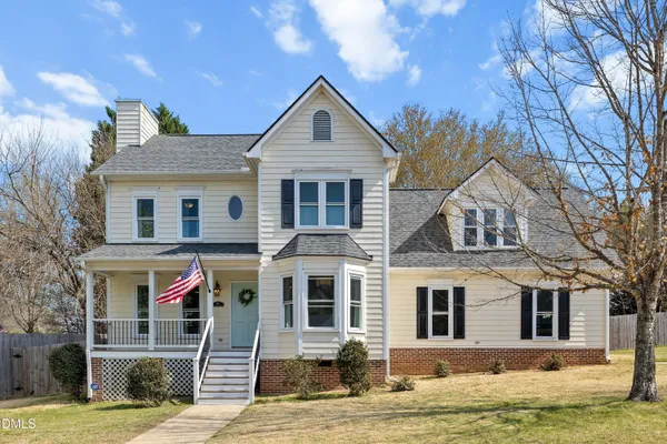 a front view of a house with a porch