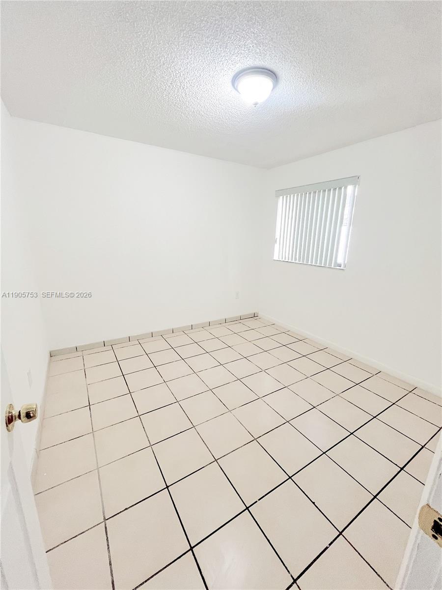 2740 West 63rd Street, Unit 104 Hialeah, FL 33016 - Photo 19 of 29 a view of a room