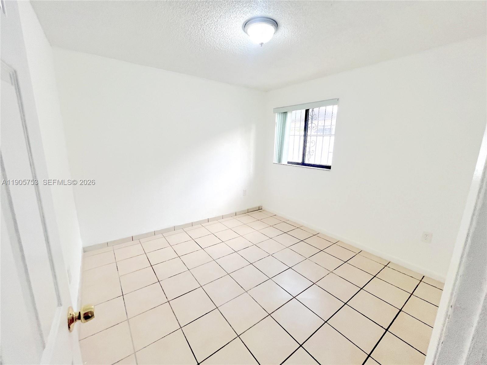 2740 West 63rd Street, Unit 104 Hialeah, FL 33016 - Photo 23 of 29 a view of a room