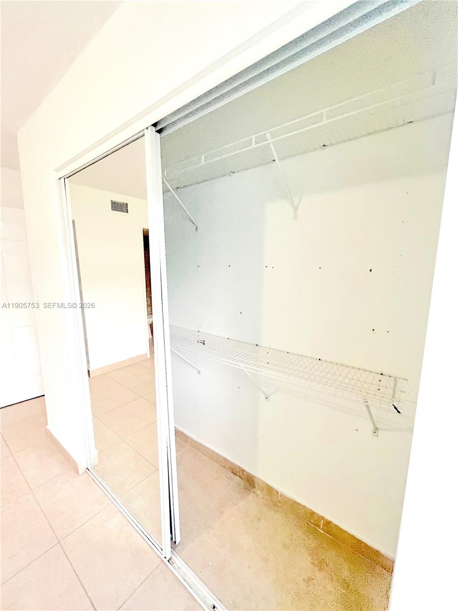 2740 West 63rd Street, Unit 104 Hialeah, FL 33016 - Photo 28 of 29 a bathroom with a shower