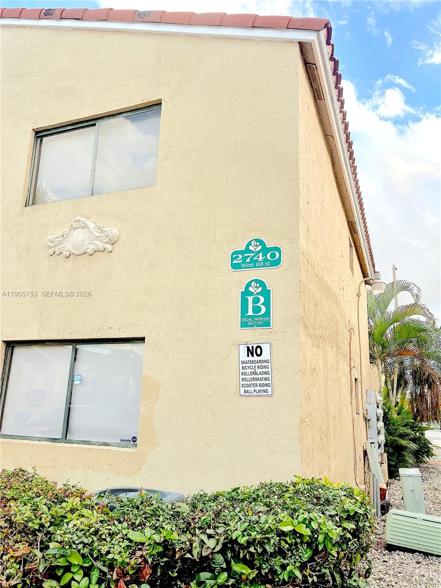 2740 West 63rd Street, Unit 104 Hialeah, FL 33016 - Photo 29 of 29 a view of a door with an outdoor space