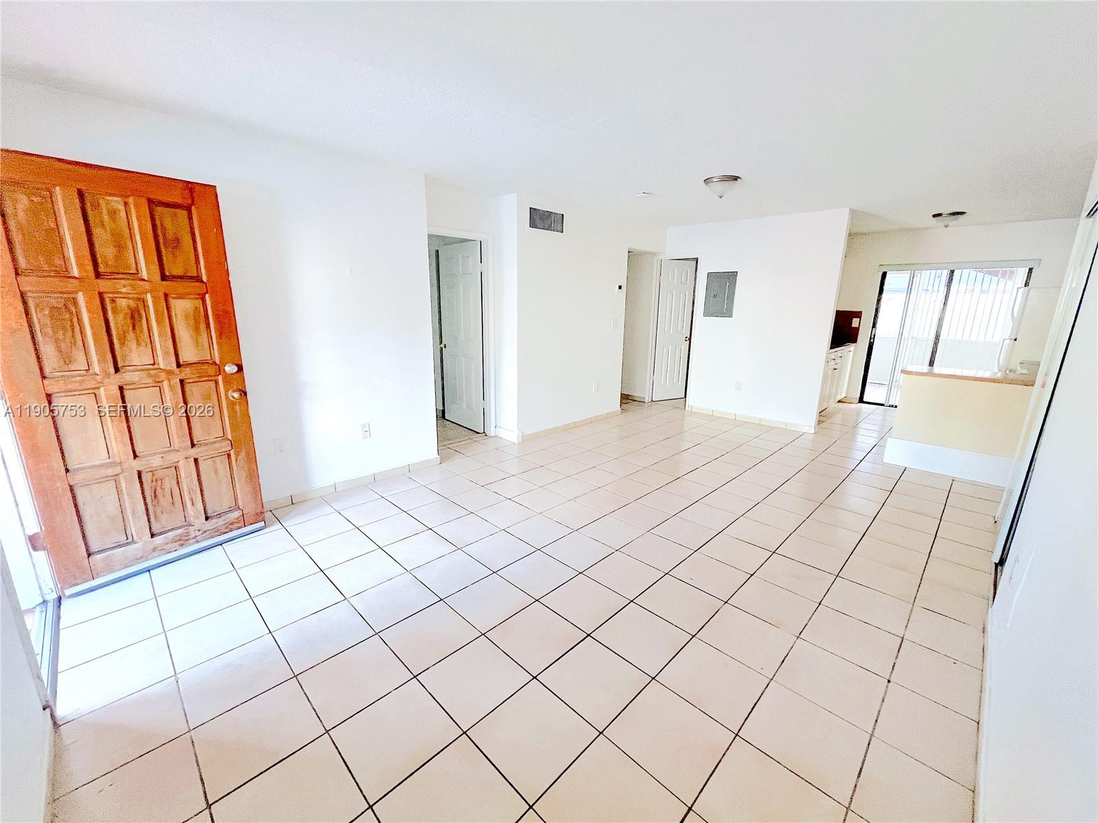 2740 West 63rd Street, Unit 104 Hialeah, FL 33016 - Photo 6 of 29 a view of an empty room