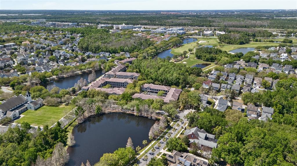 701 Westpark Way, Unit 101 Celebration, FL 34747 - Photo 64 of 69 an aerial view of multiple house