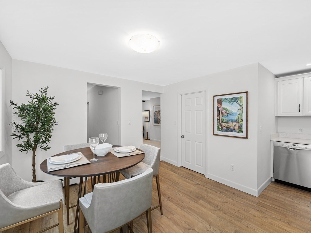 18 R Polk Street Boston, MA 02129 - Photo 2 of 19 a view of a dining room with furniture and wooden floor