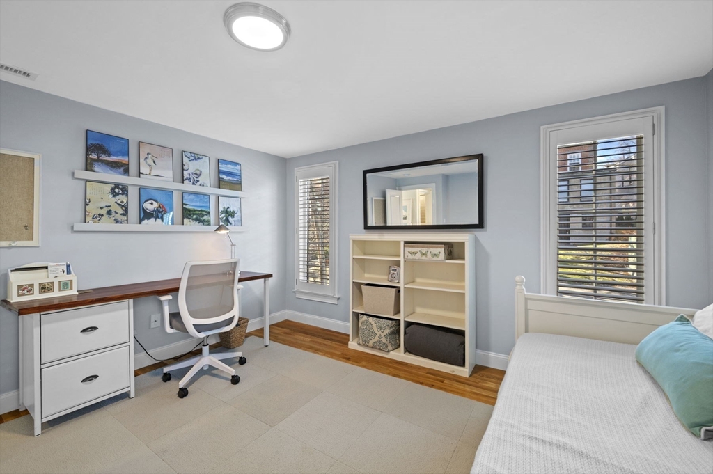 9 Hanover Court, Unit 1 Marblehead, MA 01945 - Photo 15 of 38 a view of a workspace with furniture and a window