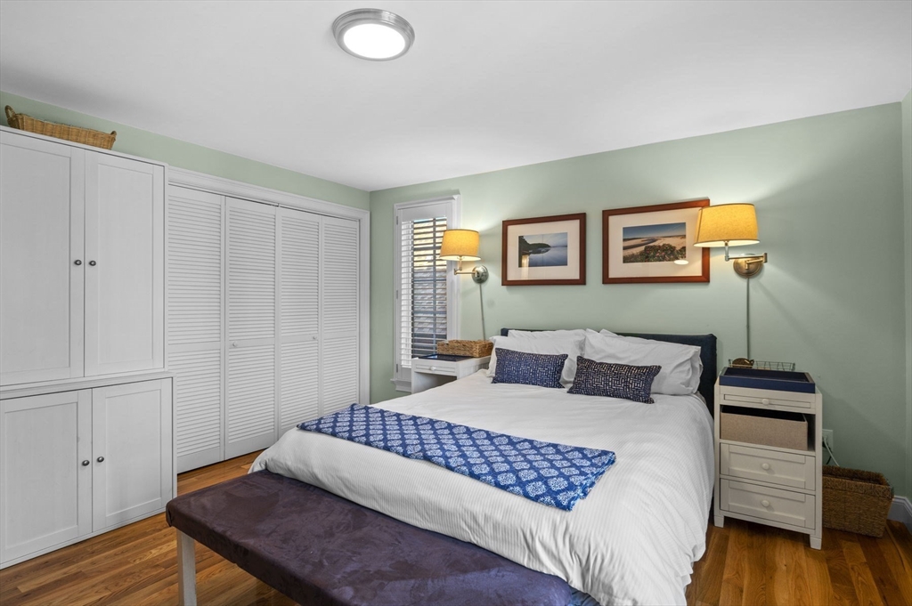 9 Hanover Court, Unit 1 Marblehead, MA 01945 - Photo 19 of 38 a bedroom with a bed and a window