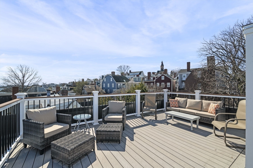 9 Hanover Court, Unit 1 Marblehead, MA 01945 - Photo 22 of 38 a terrace view with seating space