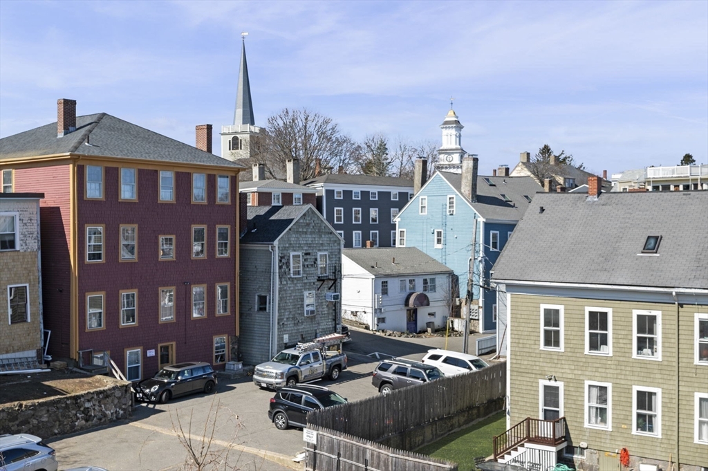 9 Hanover Court, Unit 1 Marblehead, MA 01945 - Photo 28 of 38 a front view of a building with street view
