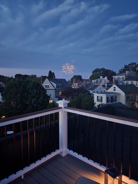 9 Hanover Court, Unit 1 Marblehead, MA 01945 - Photo 36 of 38 a view of a city from a balcony