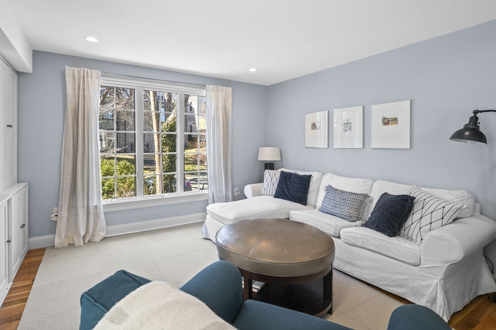 9 Hanover Court, Unit 1 Marblehead, MA 01945 - Photo 5 of 38 a living room with furniture and a large window