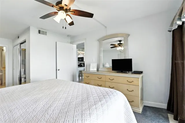 a view of a dining room with furniture and window