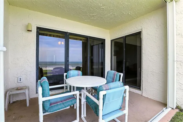 a view of a big building with a yard