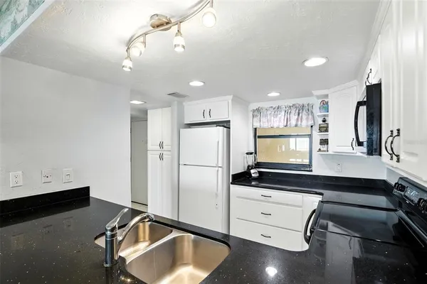 $475,000 | 4175 South Atlantic Avenue, Unit 102, New Smyrna Beach, FL 32169