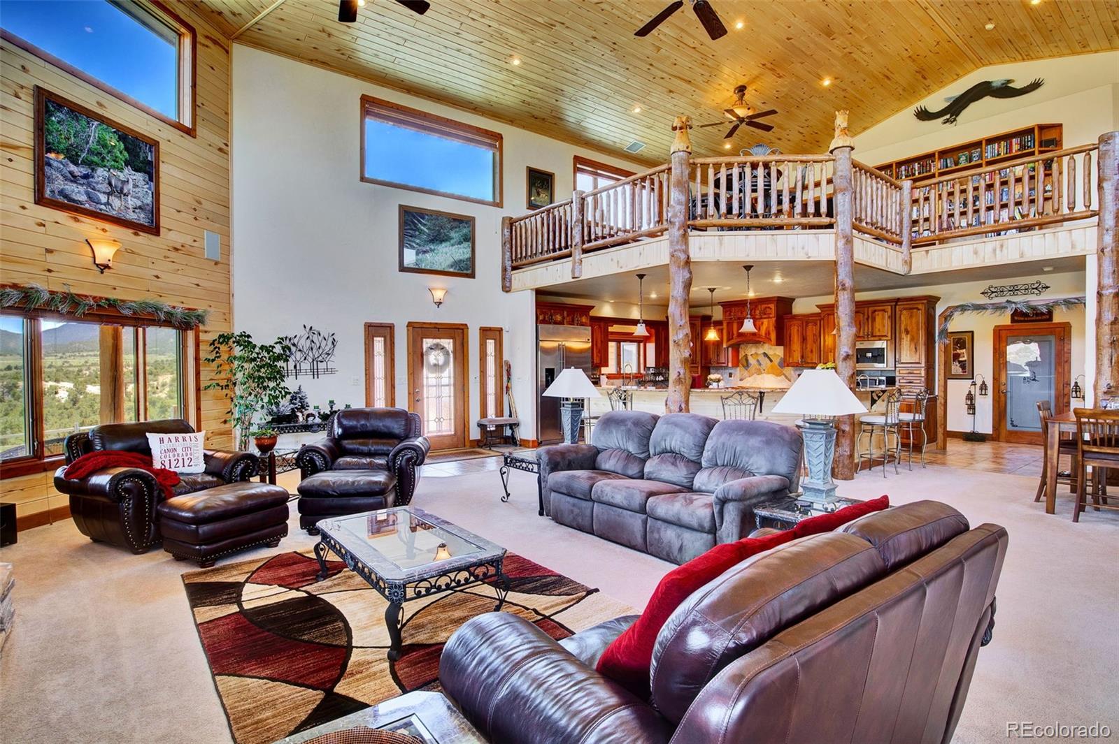400 Copper Canyon Road Canon City, CO 81212 - Photo 12 of 50 a outdoor living space with patio furniture and a ceiling fan
