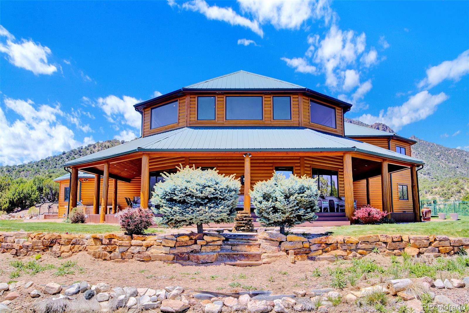 400 Copper Canyon Road Canon City, CO 81212 - Photo 2 of 50 a front view of a house with a patio