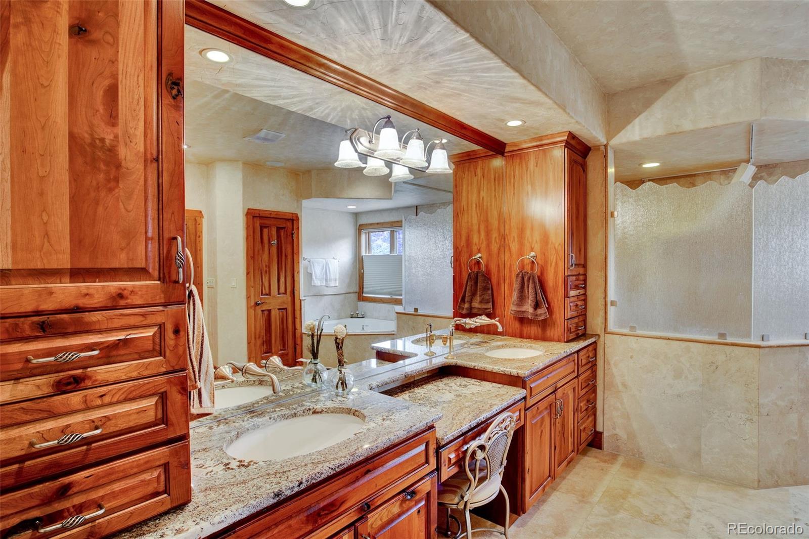 400 Copper Canyon Road Canon City, CO 81212 - Photo 22 of 50 a bathroom with a sink and a mirror