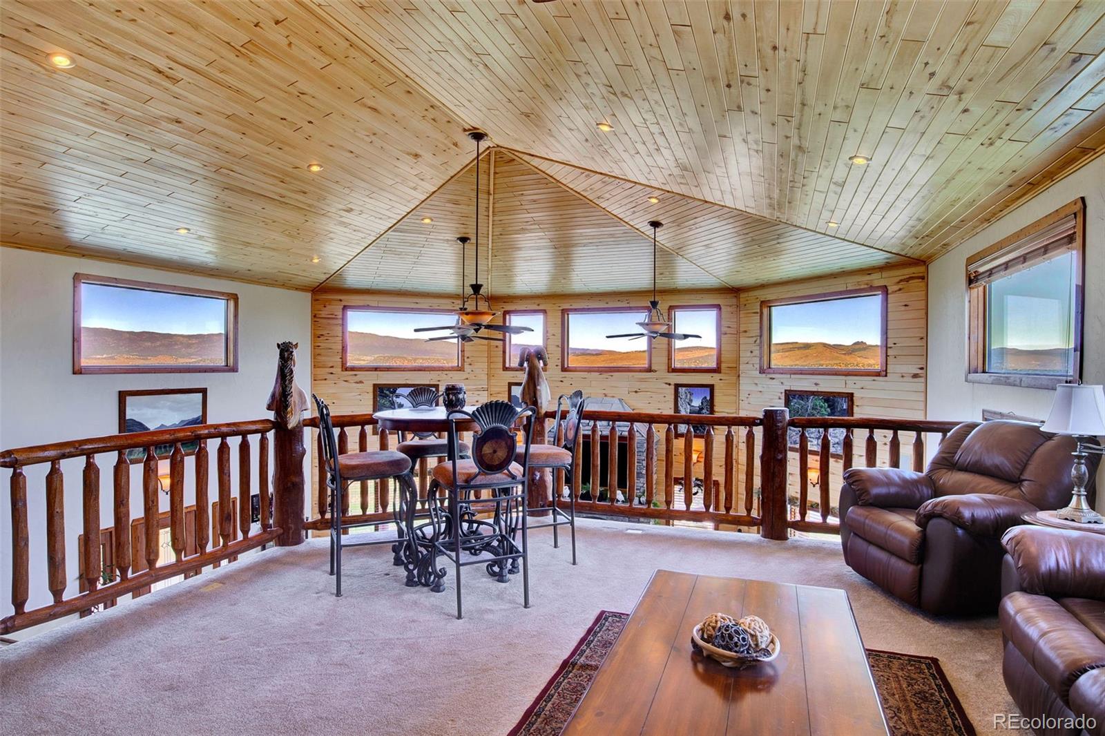 400 Copper Canyon Road Canon City, CO 81212 - Photo 27 of 50 a livingroom with furniture window and wooden floor