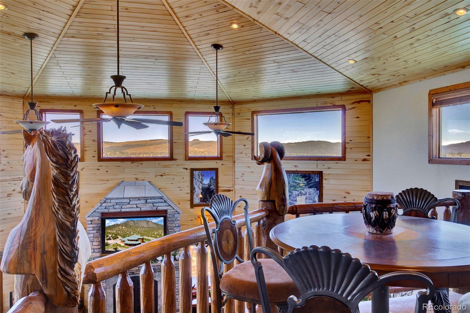 400 Copper Canyon Road Canon City, CO 81212 - Photo 28 of 50 a dining room with furniture and window