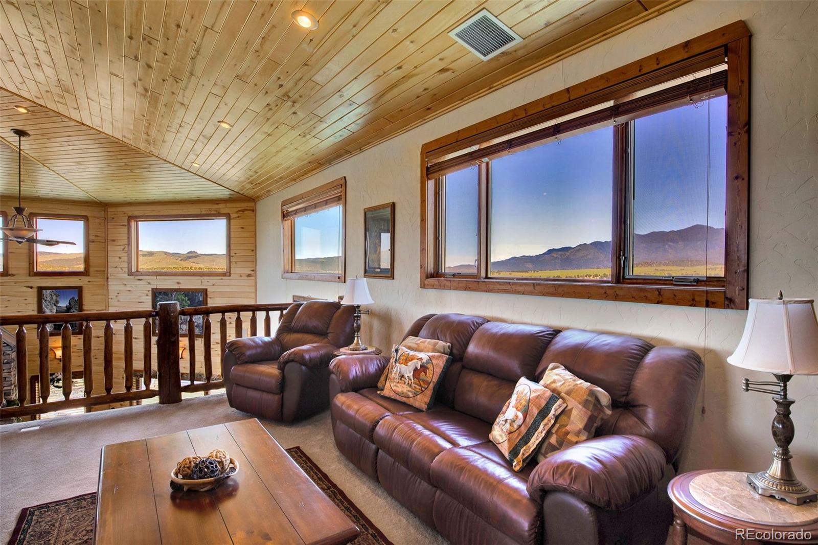 400 Copper Canyon Road Canon City, CO 81212 - Photo 29 of 50 a living room with furniture and a large window