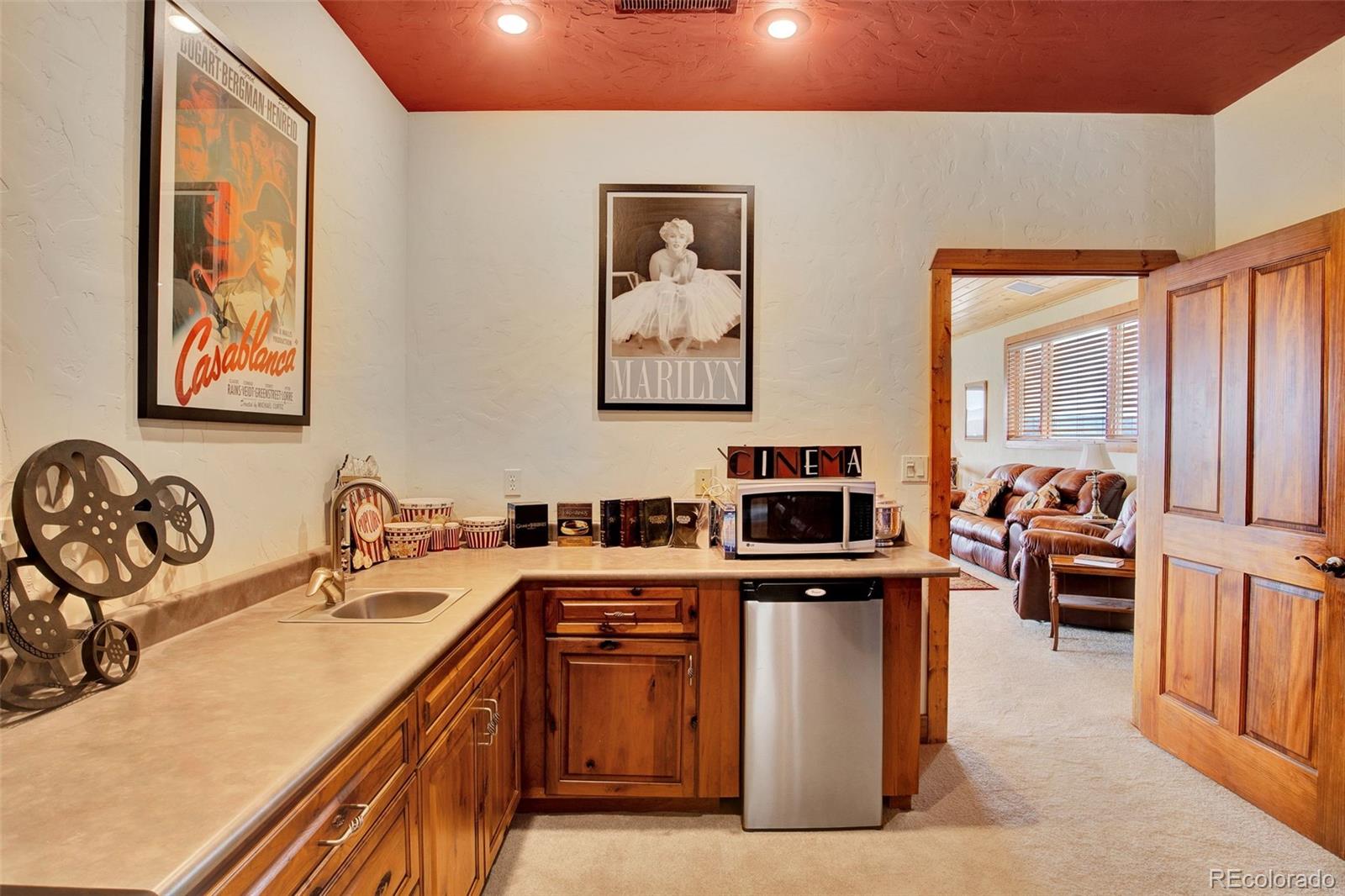 400 Copper Canyon Road Canon City, CO 81212 - Photo 34 of 50 a kitchen with stainless steel appliances granite countertop a sink stove and cabinets