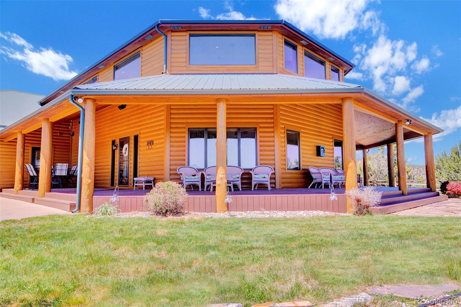 400 Copper Canyon Road Canon City, CO 81212 - Photo 4 of 50 a view of a house with backyard and porch