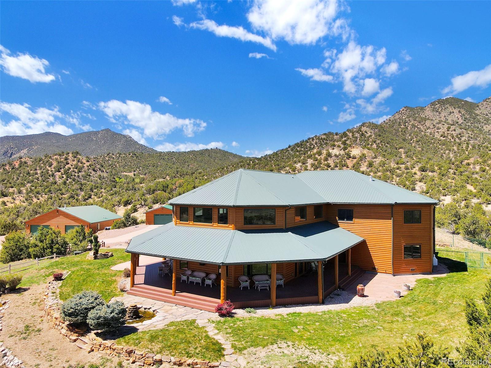 400 Copper Canyon Road Canon City, CO 81212 - Photo 41 of 50 a front view of a house with a yard