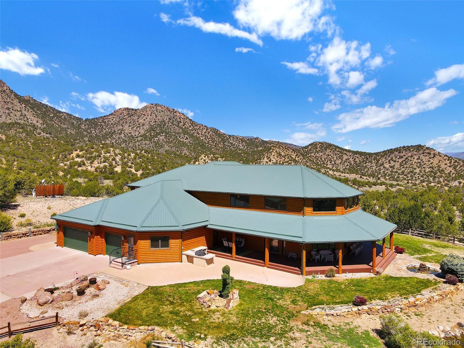 400 Copper Canyon Road Canon City, CO 81212 - Photo 44 of 50 a view of a house with a yard porch and sitting area