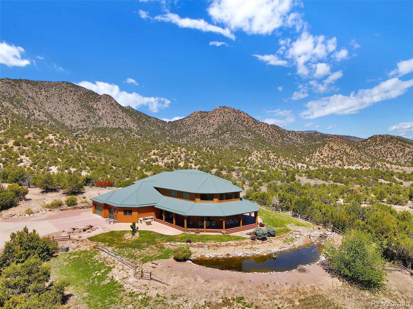 400 Copper Canyon Road Canon City, CO 81212 - Photo 47 of 50 a view of a house with a yard