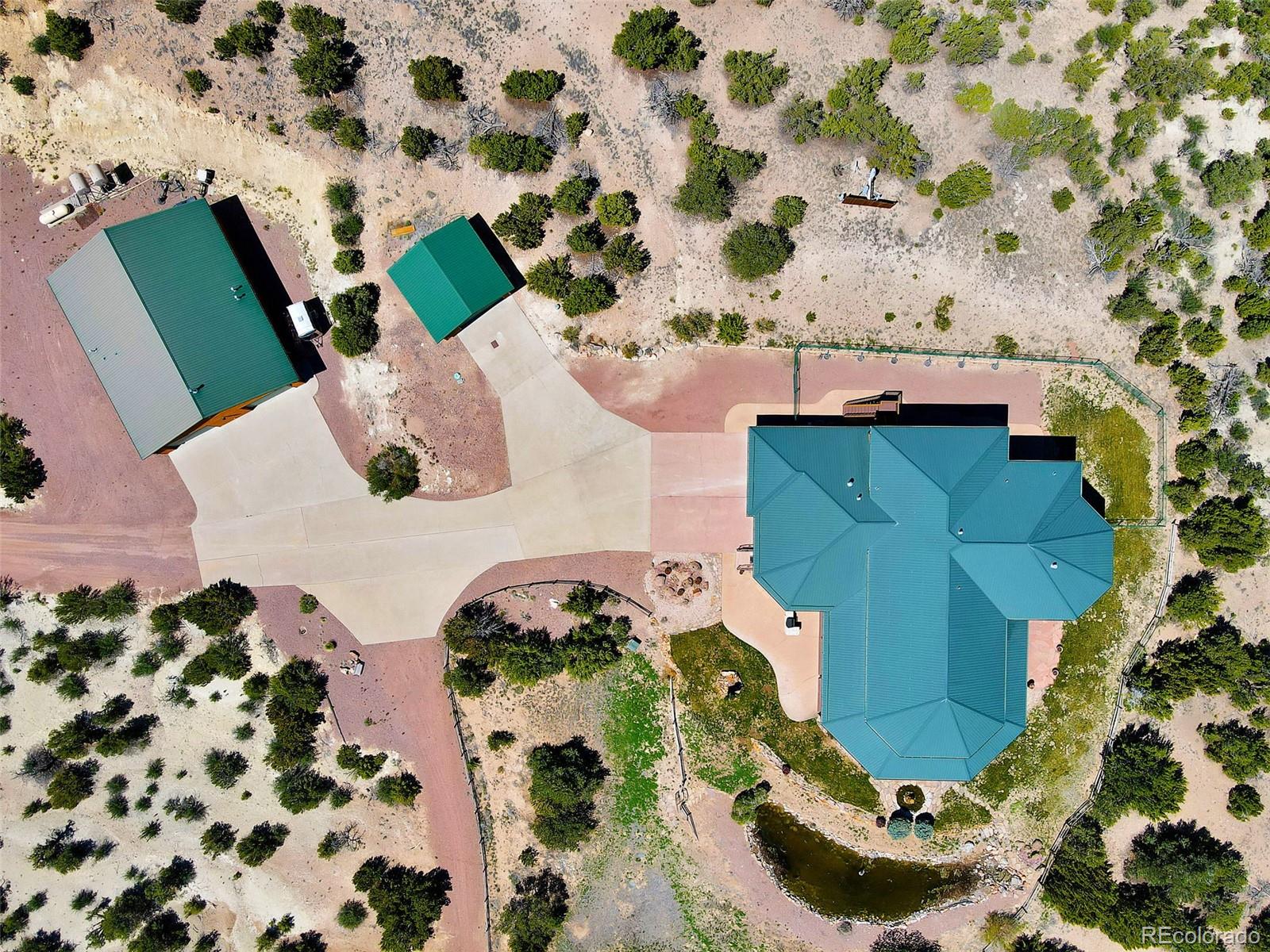 400 Copper Canyon Road Canon City, CO 81212 - Photo 48 of 50 an aerial view of a house a yard and green space
