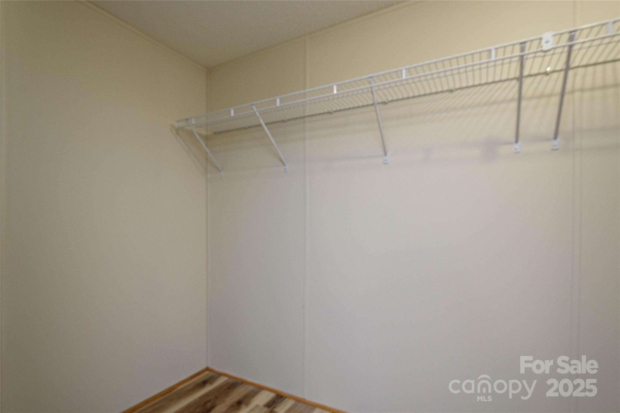 1361 Pleasant Grove Church Road Hendersonville, NC 28739 - Photo 34 of 48 a view of a room with racks on the wall