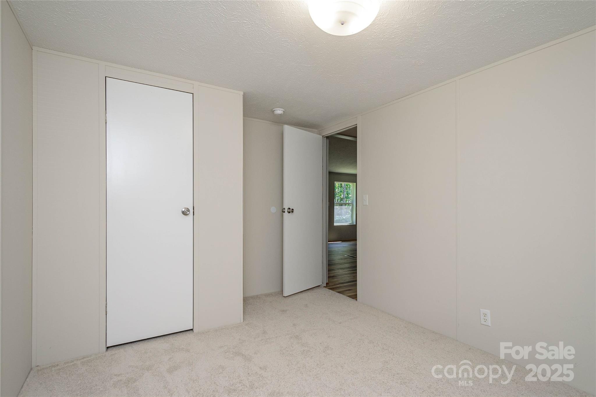 1361 Pleasant Grove Church Road Hendersonville, NC 28739 - Photo 37 of 48 a view of an empty room