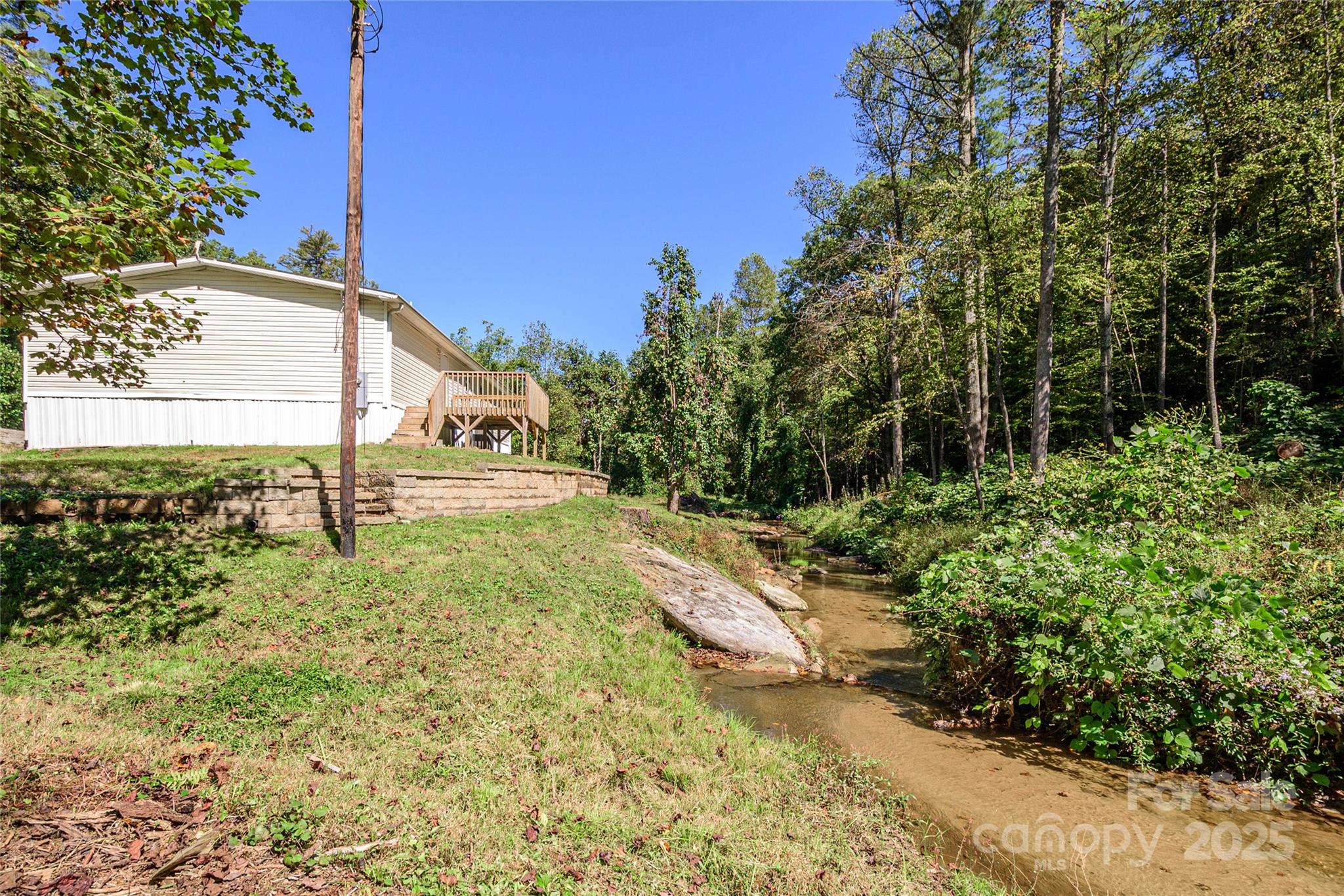 1361 Pleasant Grove Church Road Hendersonville, NC 28739 - Photo 4 of 48 a view of a garden with plants