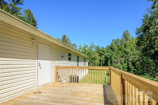a view of deck with a wooden fence