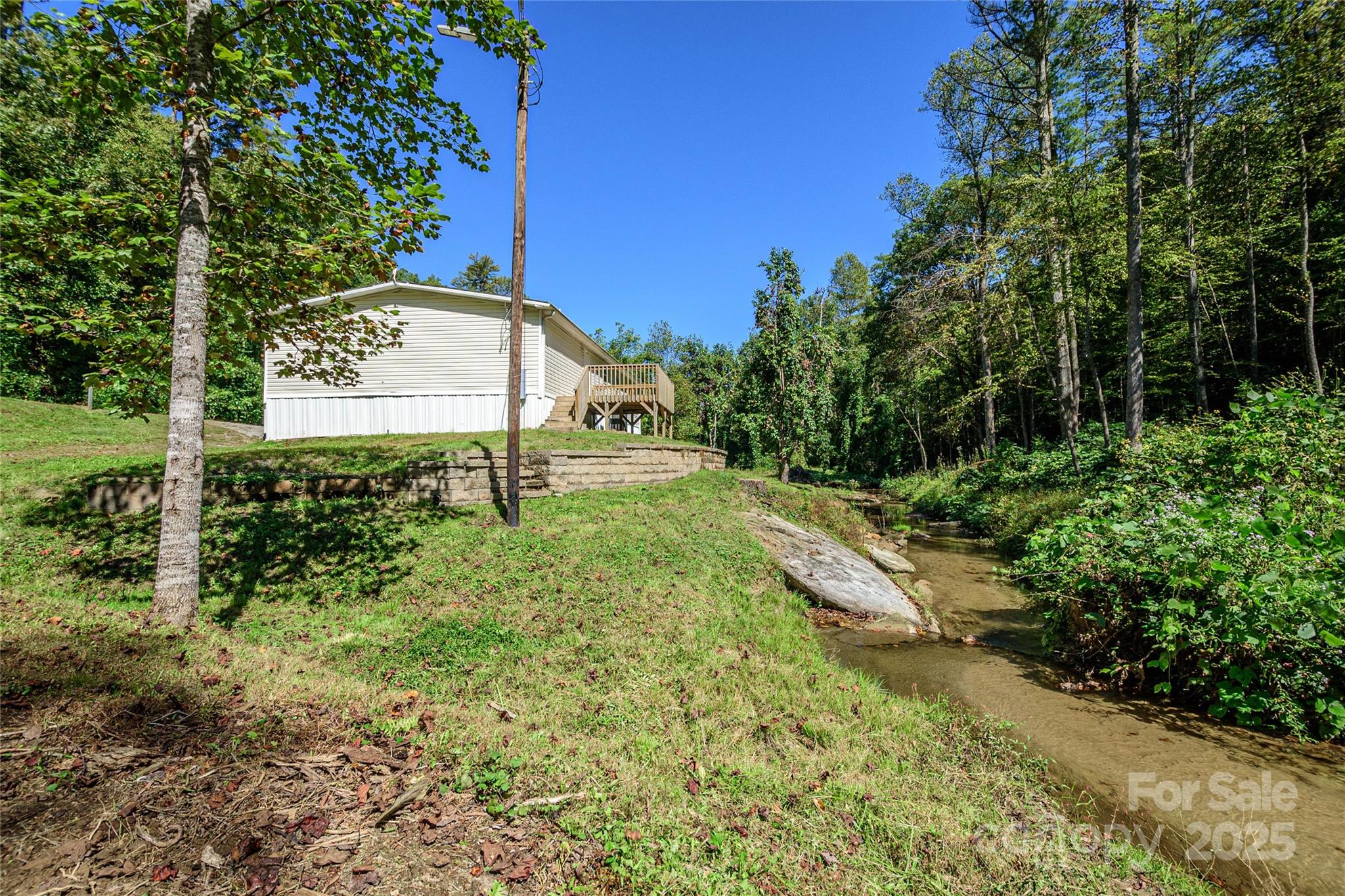 1361 Pleasant Grove Church Road Hendersonville, NC 28739 - Photo 6 of 48 a view of a back yard