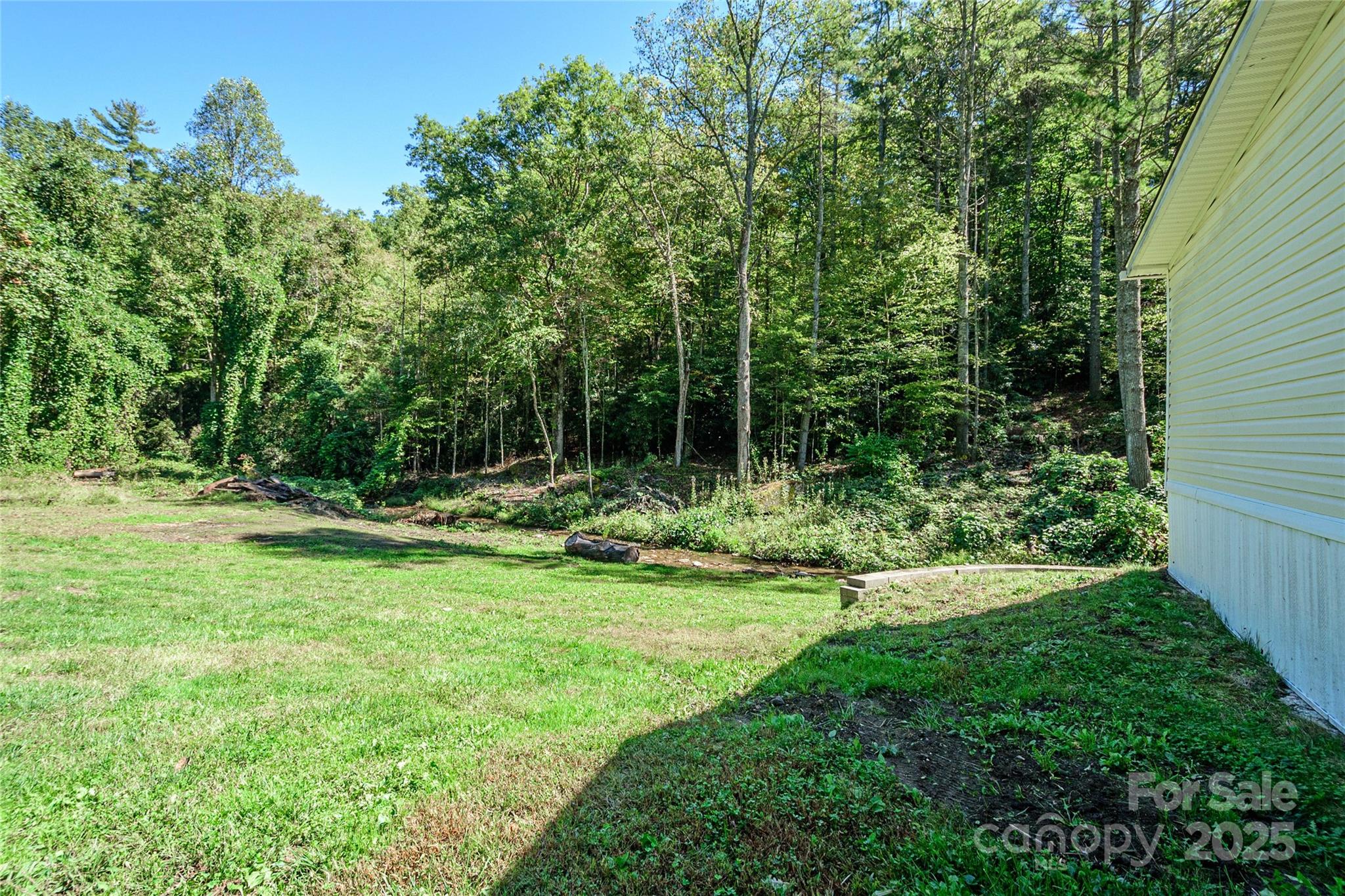 1361 Pleasant Grove Church Road Hendersonville, NC 28739 - Photo 8 of 48 a view of outdoor space with deck and yard