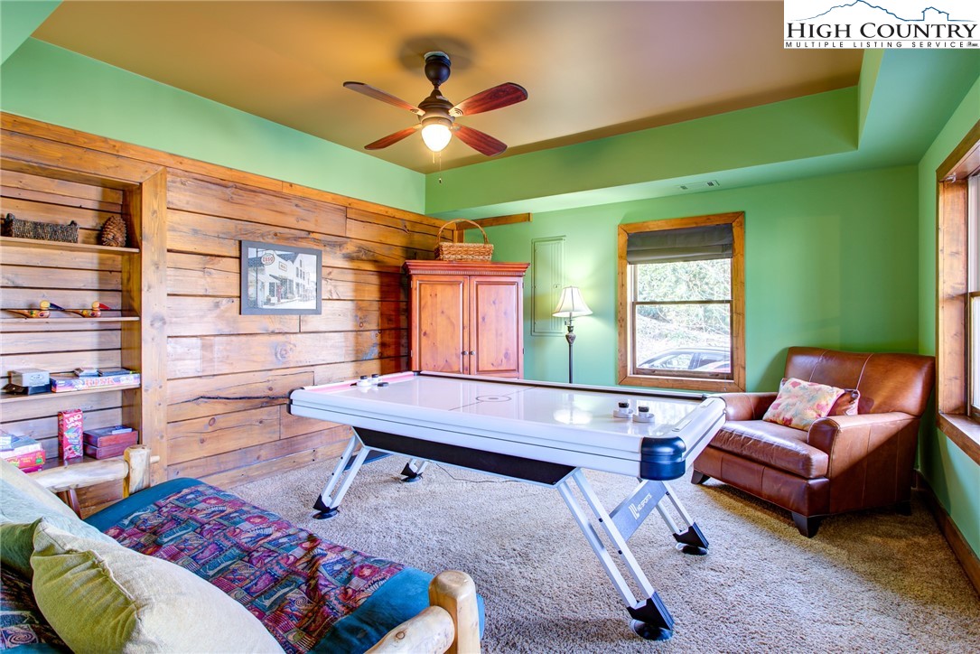 186 Riversound Drive Banner Elk, NC 28604 - Photo 11 of 45 a living room with furniture and a large window