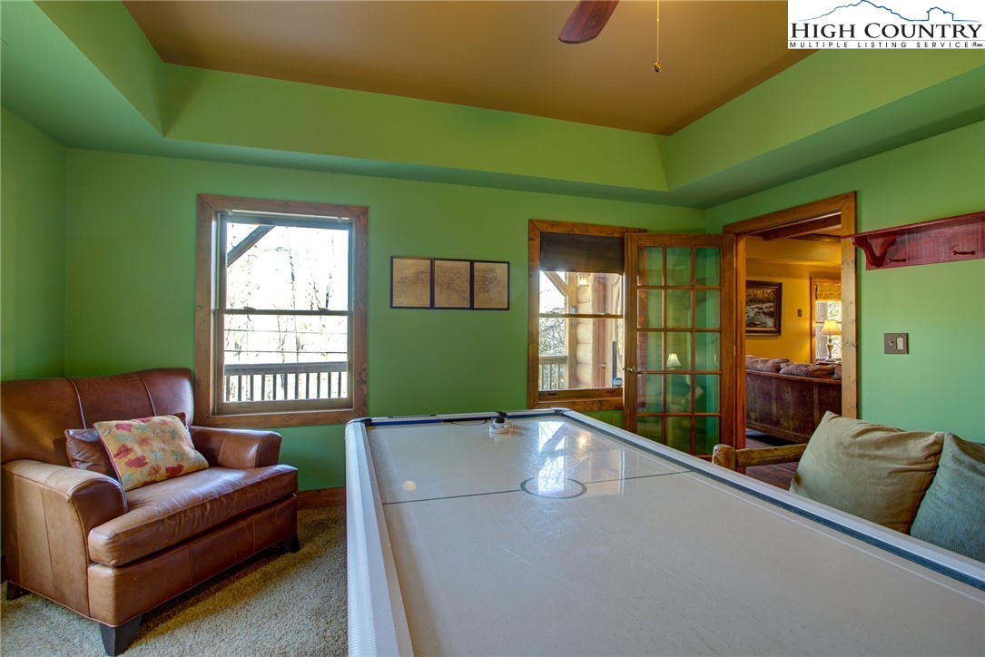 186 Riversound Drive Banner Elk, NC 28604 - Photo 12 of 45 a living room with furniture and a window