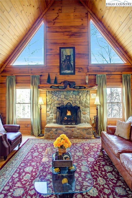 186 Riversound Drive Banner Elk, NC 28604 - Photo 15 of 45 a living room with furniture rug and a fireplace